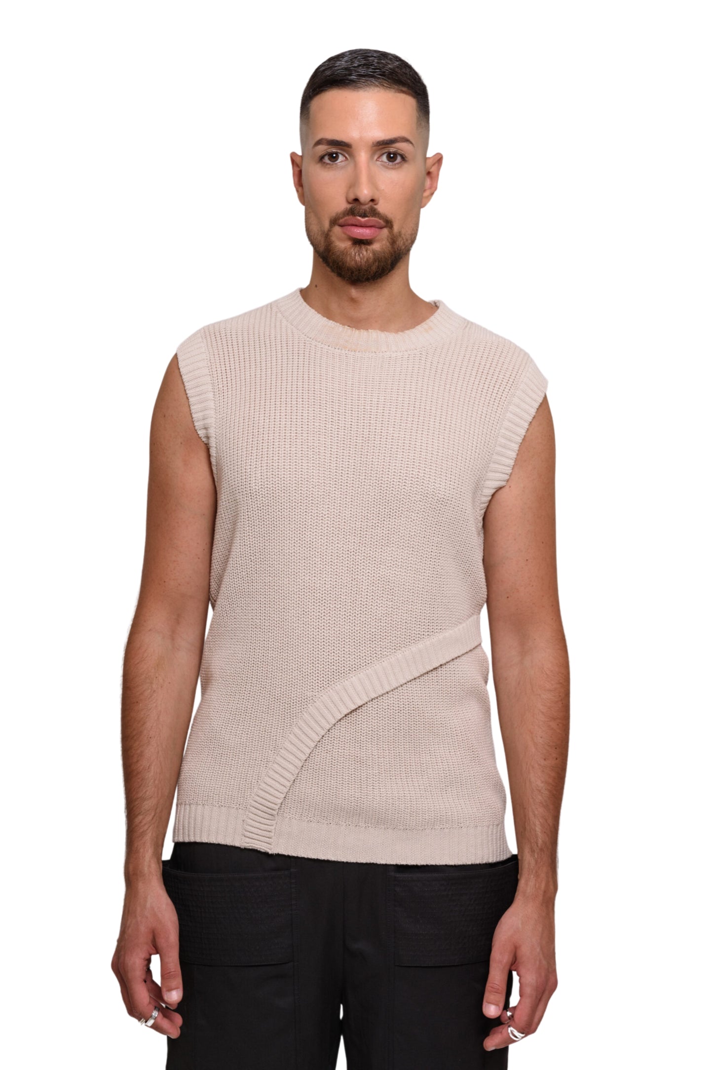 model wears beige knitted vest