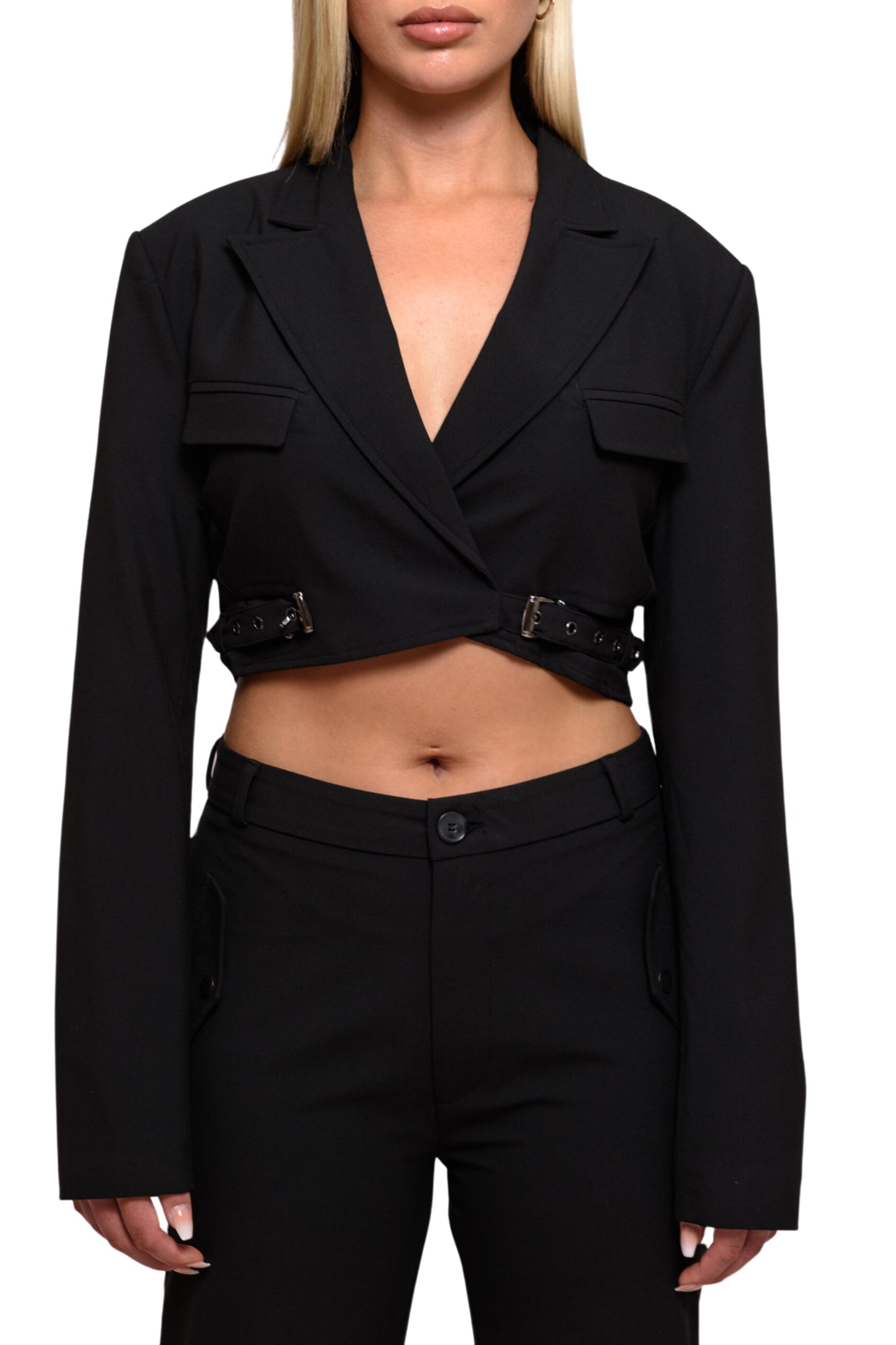 model posing with black cropped blazer