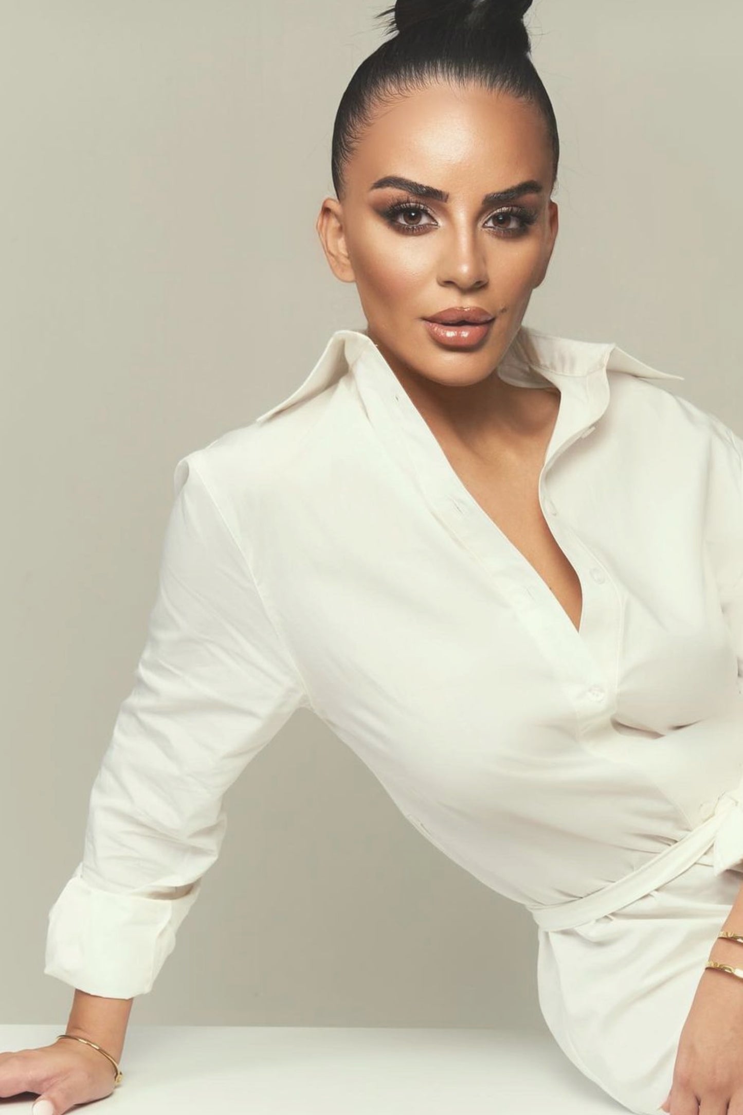 model sitting wearing poplin shirt dress