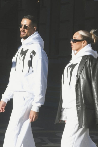 two models wears white joggers and hoodies